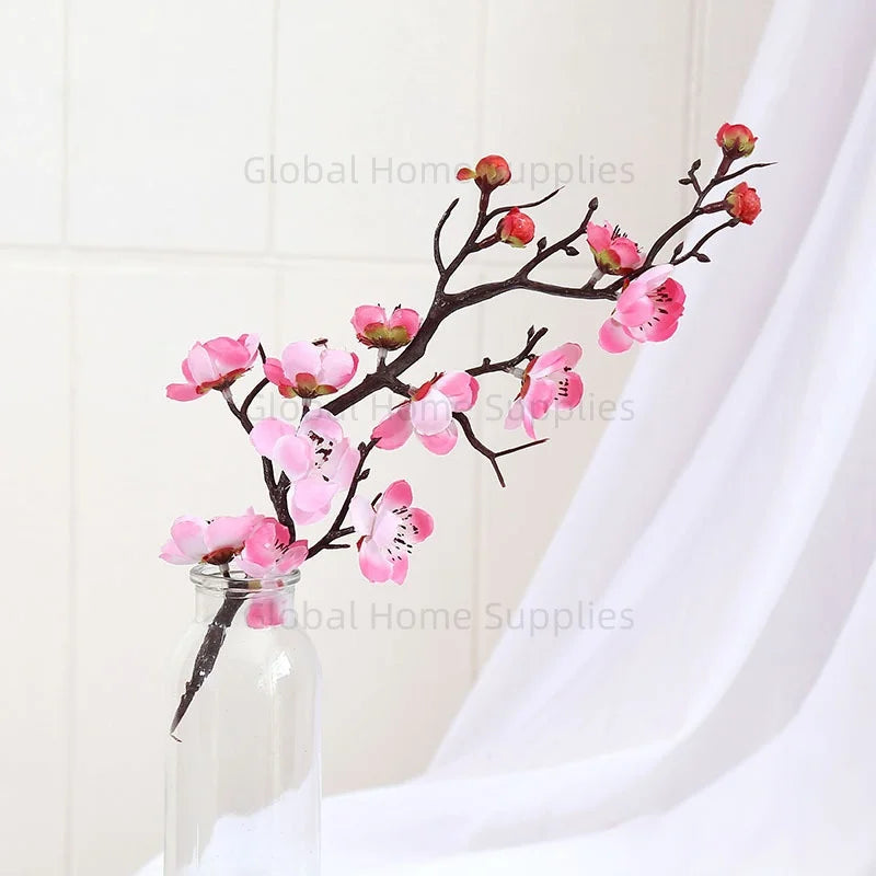 décoration intérieure branche fleurs artificielles rouge blanc rose naturel minimaliste