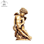 statue ange enfant dorée ailes base végétale renaissance ornement décoration intérieur classique erotique miniature