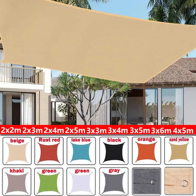 Voile d'ombrage rectangulaire 6x4 m gris foncé sur terrasse
