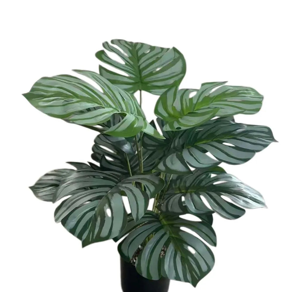 plantes artificielles grandes feuilles vertes blancs moderne tropicale décoration mur extérieur accrochées