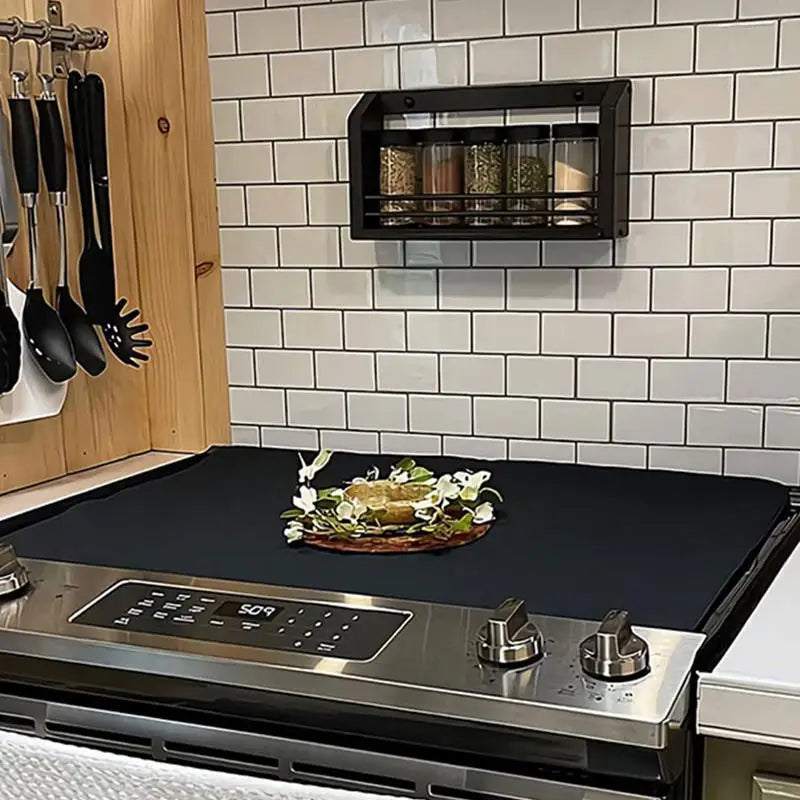 tapis cuisinière moderne noir clips protection antidérapante induction électrique 53cm 61.5cm