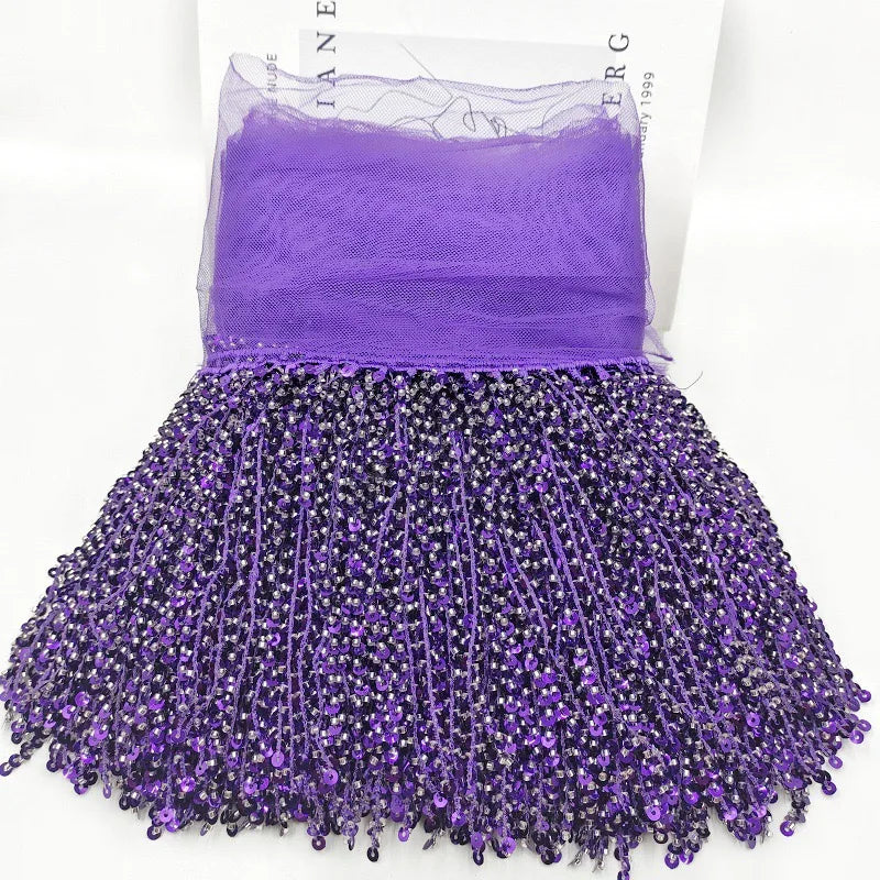 jupe déguisement sequins dorés ruban fixation largeur 16cm polyester violet rouge jaune rose vert