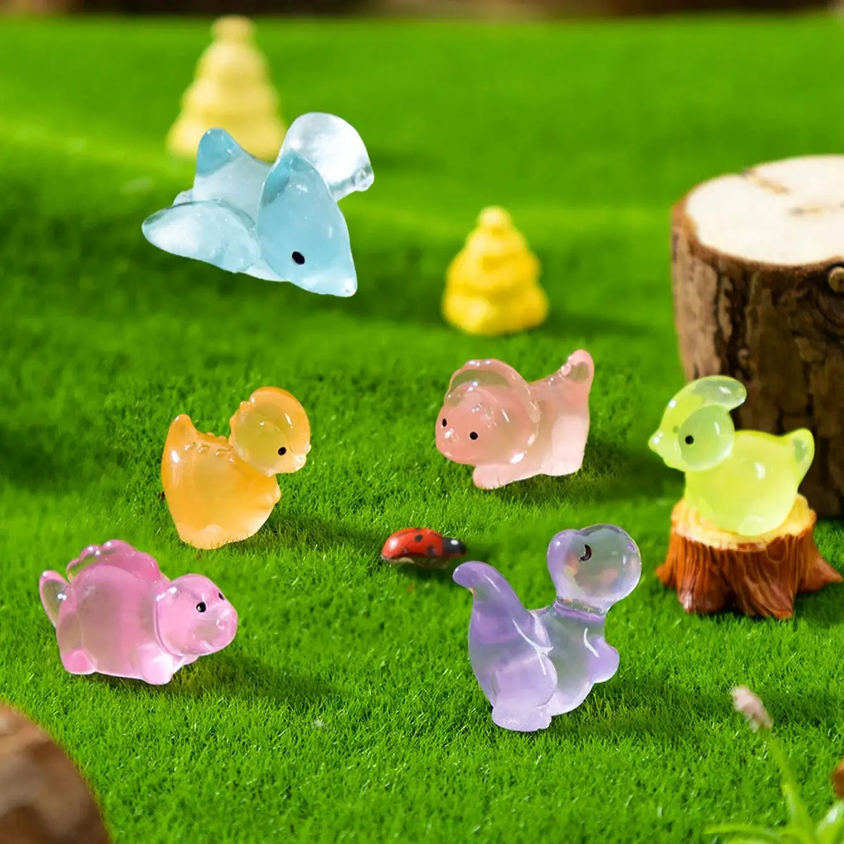 figurines animaux miniatures résine transparentes pastorelles rose vert bleu violet hippopotame dinosaurien