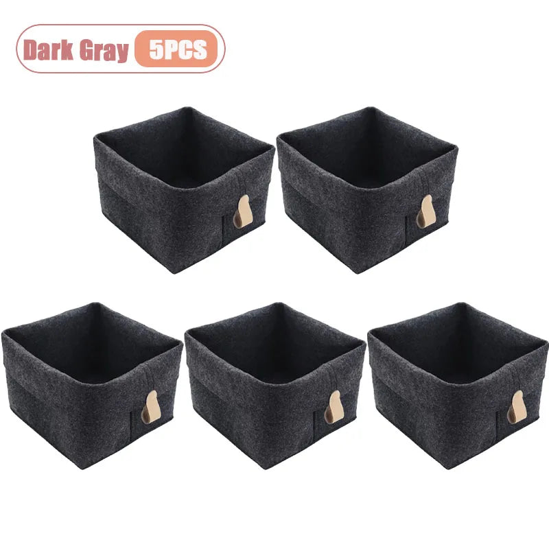 boîte rangement tissu veloutée gris clair foncée moderne pliable articles divers serviettes blanches broderie