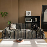 housses canapé moderne rayées tissu épais franges noir beige