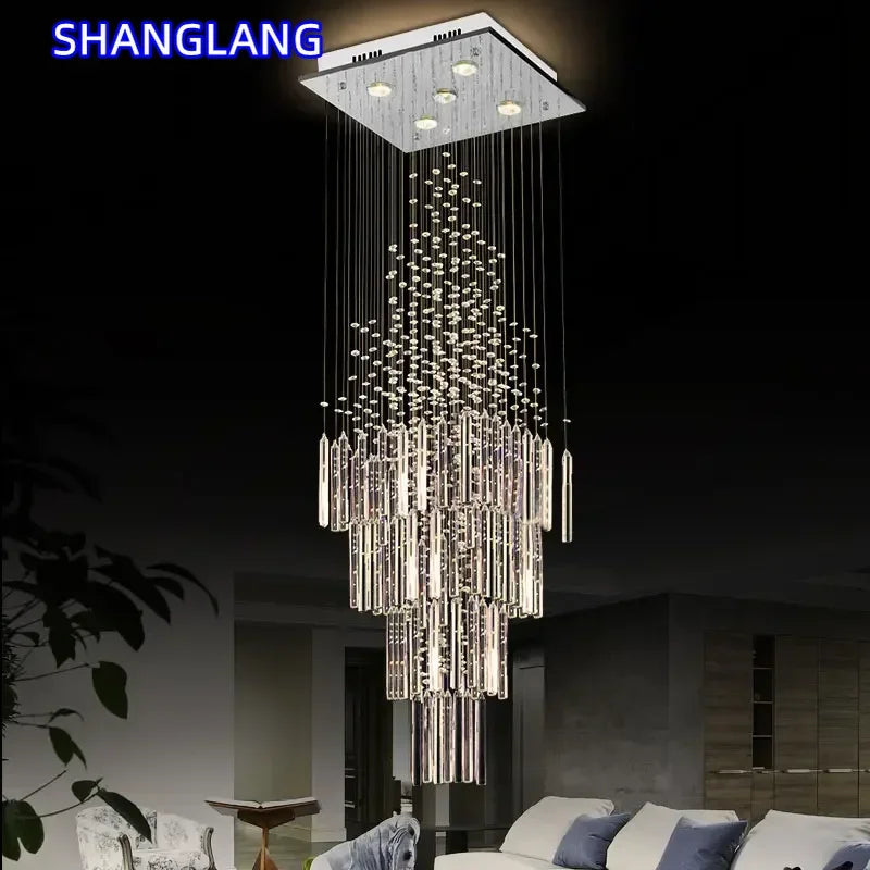 lustre cristal moderne suspension salon escalier luminaire argenté luxe intérieur appartement