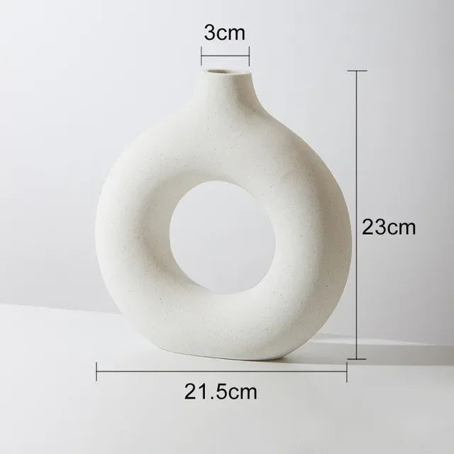 vases modernes roseclair beige noir bougies fleurssséchées décorationintérieure texturegrained minimaliste setdeco