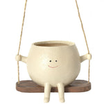 cache pot suspendu résine texture grungée moderne plante succulente support bois couleur beige clairintérieur