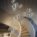 suspension lumineuse moderne transparente feuilles stylisées éclairage intérieur contemporain doré fixations