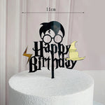 décoration gâteau anniversaire harry potter étoiles chapeau lunettes balai noir
