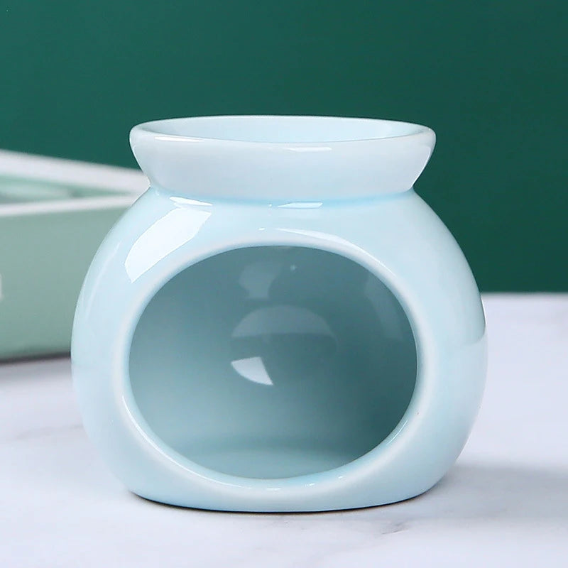 diffuseur d'odeurs brûleur d'arômes bougie céramique moderne vert bleu rouge rose jaune blanc salon