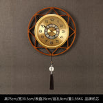 horloge murale or noir motif géométrique tissu classique tassel moderne