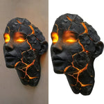 masque sculptural noir orange texture craquelée effet lave art contemporain sans fixation visible