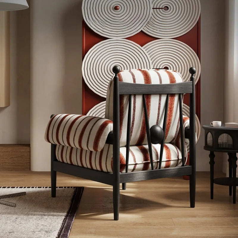 fauteuil rembourré moderne scandinave assise rayée couleur marron rouille coussins pieds apparents