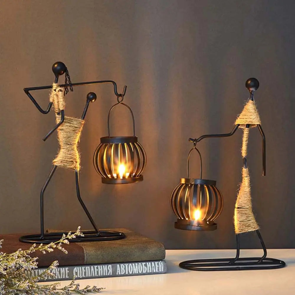 lanterne moderne minimaliste métal noir suspension bougie décoration intérieure contemporain porte chandelier abstrait