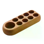 présentoir bois naturel rangement huiles essentielles flacons minimaliste salon beauté compartiments marbre marronclair