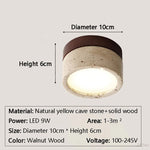 lampe moderne minimaliste bois pierre texture naturelle beige brun foncé éclairage led murale