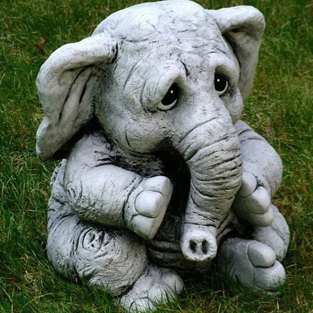 statue éléphant gris blanc décoratif jardin animalier texturé extérieur triste expressioniauxenfantin herbe vigne