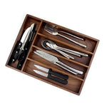 Boîte de rangement utilisée pour organiser des couverts en argent