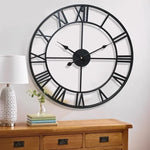horloge murale industrielle vintage aiguilles métal chiffres romains noir doré salon decoration