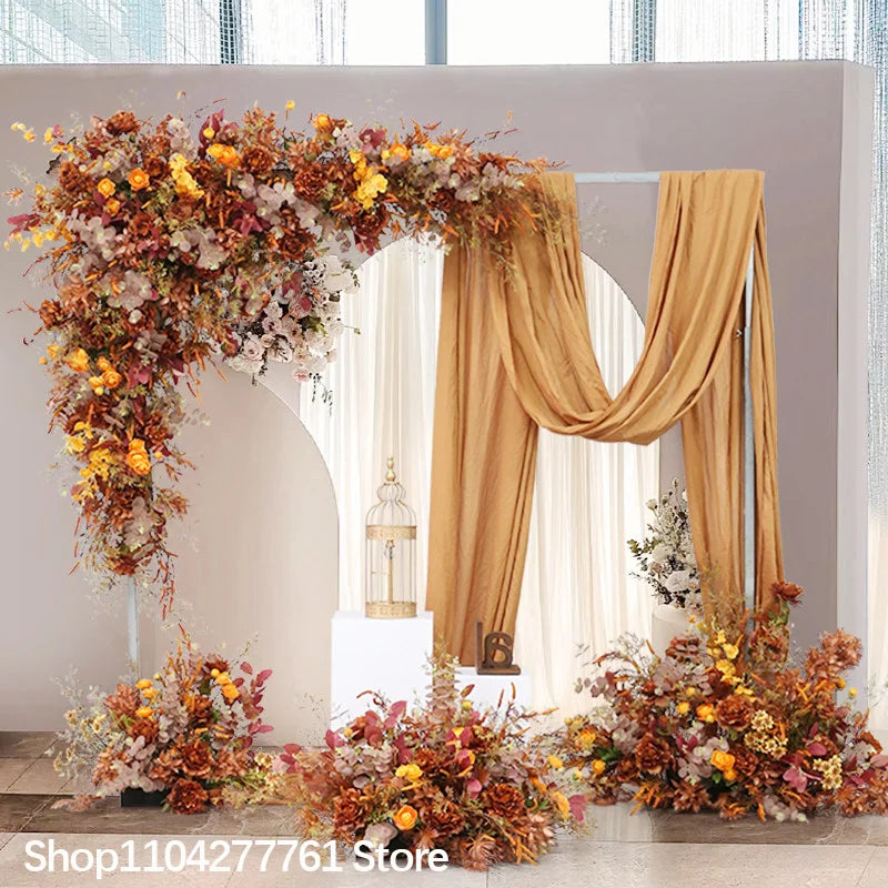 décoration événement mariage arc floral composition feuilles branches rustique automnale