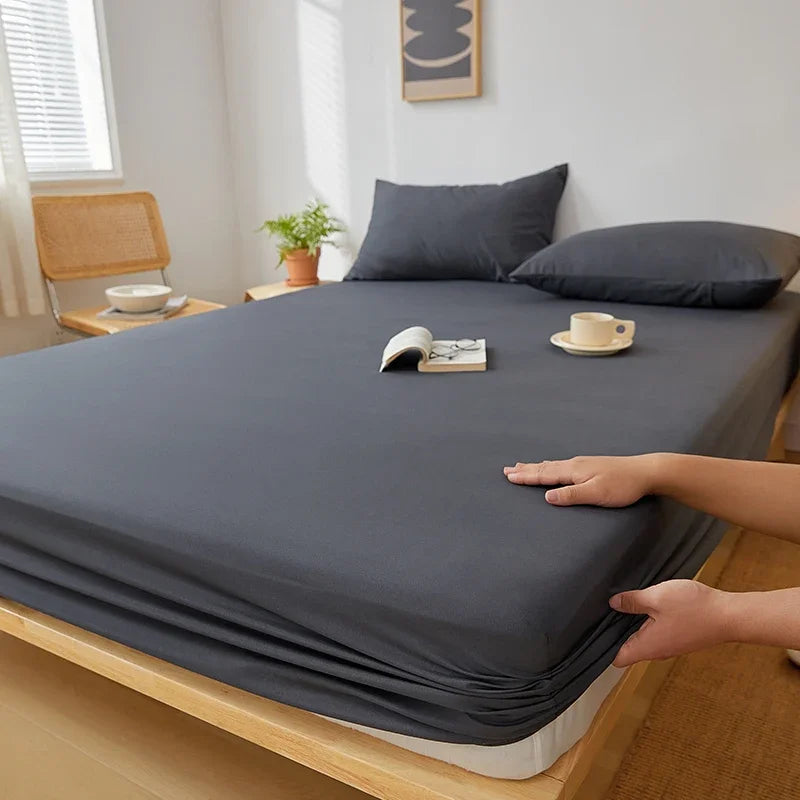 Drap-housse en coton antidérapant sur lit 140x200