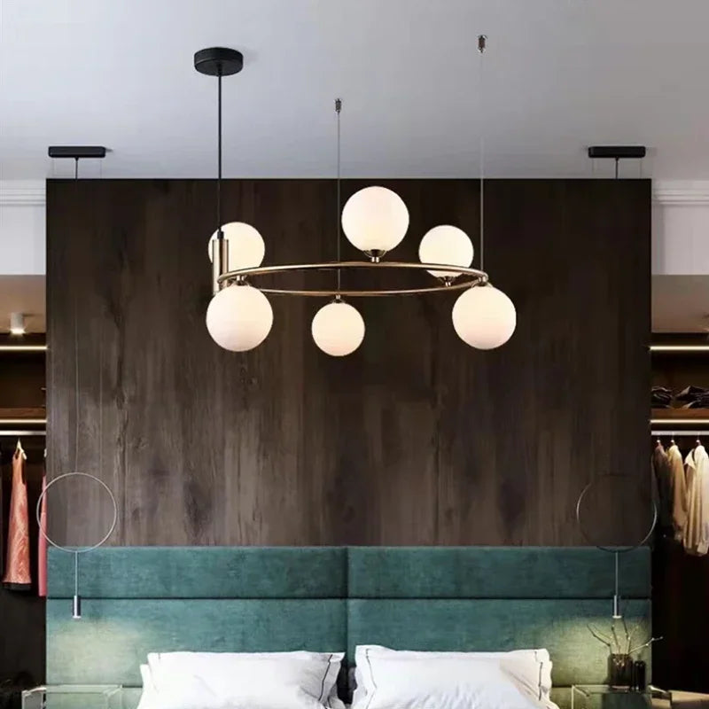 suspension luminaire moderne sphères verre translucides anneau métal doré salon chambre scandinave