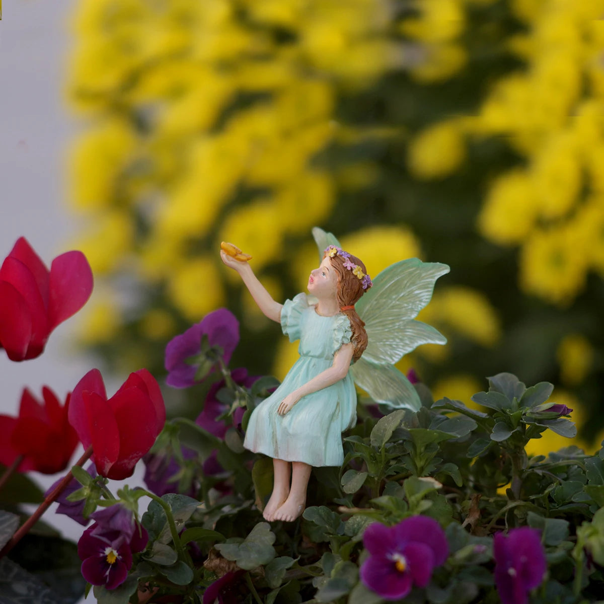 figurine fée jardin bleu vert rose ailes translucides piquet métallique robe volants couronne fleurieextérieur