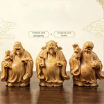 statues sculptées bois naturel artisanal traditionnel trois pièces bébé motifs floraux géométriques maison chambre