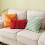 coussins rectangulaires pelucheux rayures horizontales vert pastel rose clair doux confortables adhésifs zippables adultes