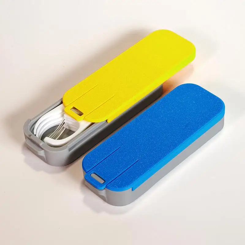 boîte rangement câbles gris jaune bleu texture mat moderne anneau fixation portable sécurisée