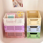 boîtes rangement pliables plastique vert clair rose pâle moderne perforations poignées rangement étudiant