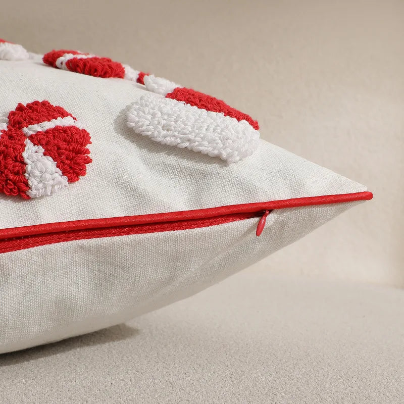 coussin noël brodé blanc rouge motifs cannes sucre opacité décoratif zipper