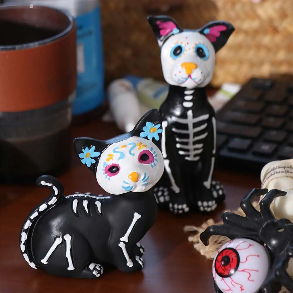 figurines animaux squelettes halloween noires fleurs peintes citrouilles araignées déco automne