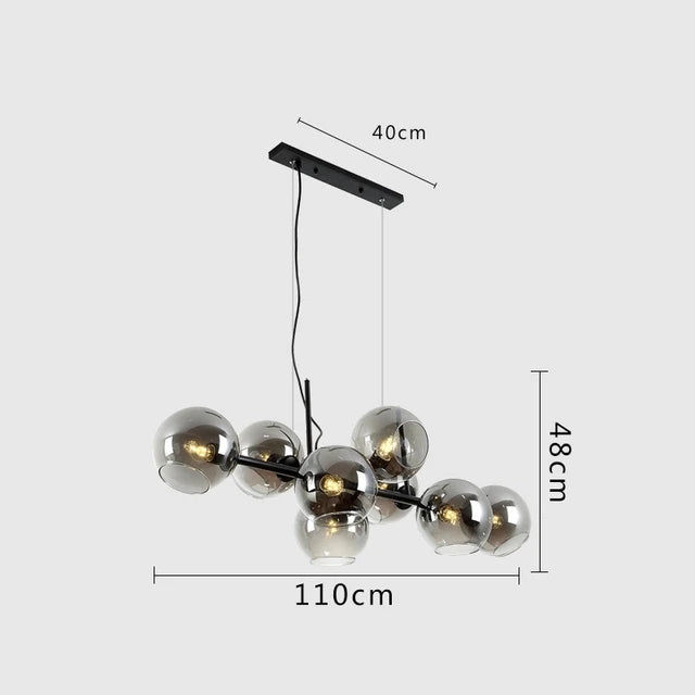 Suspension lumineuse moderne sphères transparentes dorées structure métallique noir chambre salon