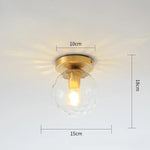 lampe moderne verre transparent noir doré élégante sphérique éclairage contemporain
