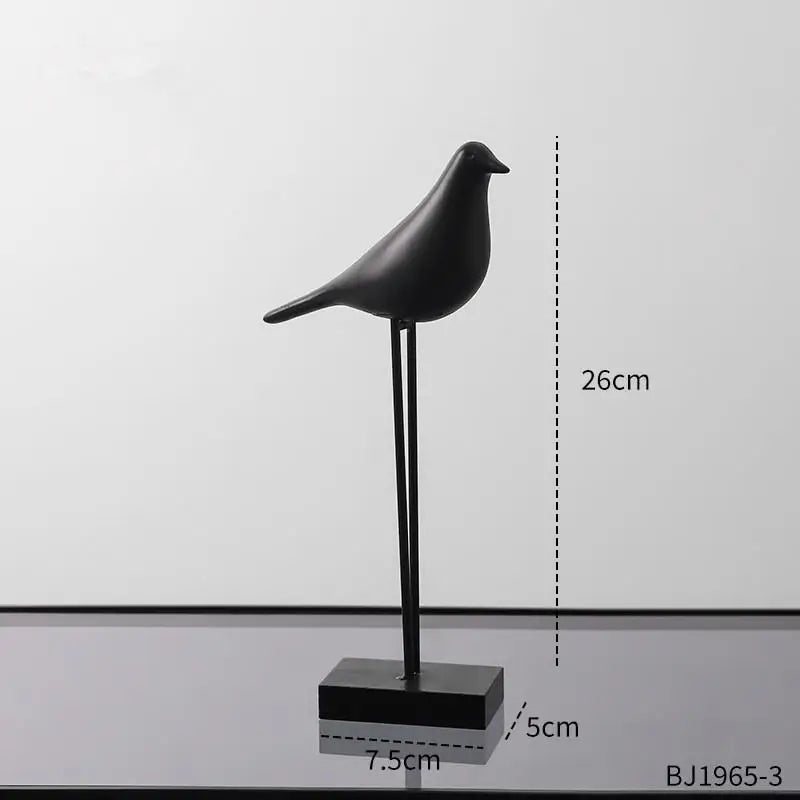 statues oiseaux noir blanc minimaliste sculpture deco intérieur base plate pieds minces