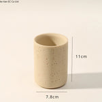 ensemble salle bain moderne beige clair brosse dents tube dentifrice distributeur savon tasses résine