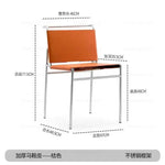 chaise moderne cuir couleur orange noir blanc tringles chromées contemporaine