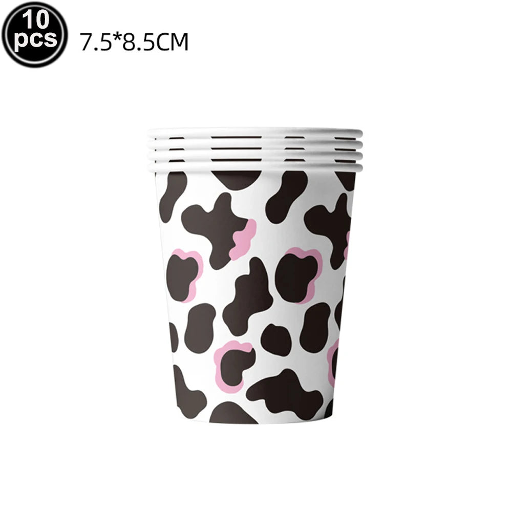 assiettes gobelets serviettes nappe décoration vache taches noires roses anniversaire fête enfants blanc rose