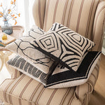 coussin brodé géométrique moderne beige noir amovible lavable