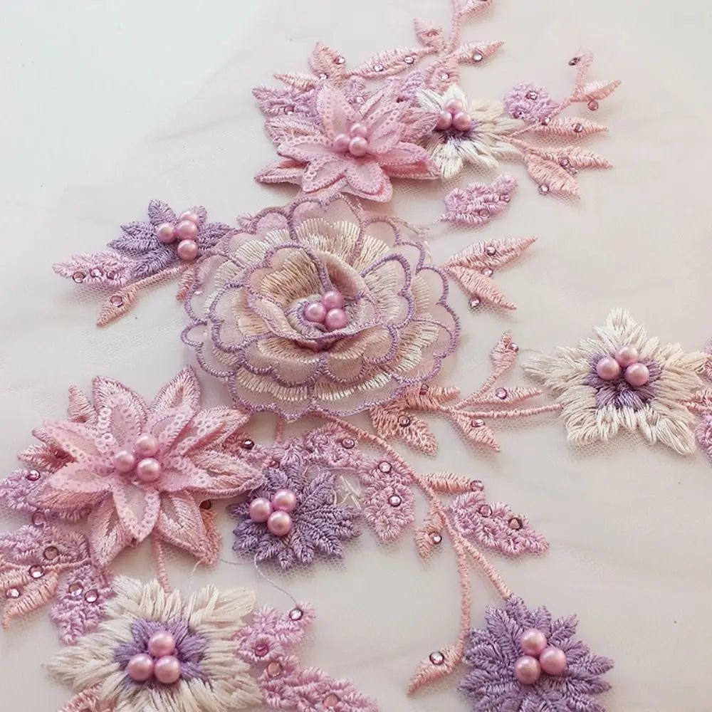 appliques textiles fleurs brodées couleurs rose beige violet vert