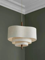 suspension lumineuse tissu beige clair moderne salon lumière led fer chaîne métallique