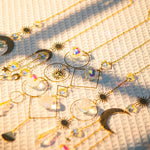 bijoux pendentifs cristal arc ciel boho chic or transparent vintage étoiles lunes motifs géométriques