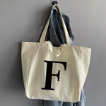 sac main femme toile beige clair lettre noire poignées détachables