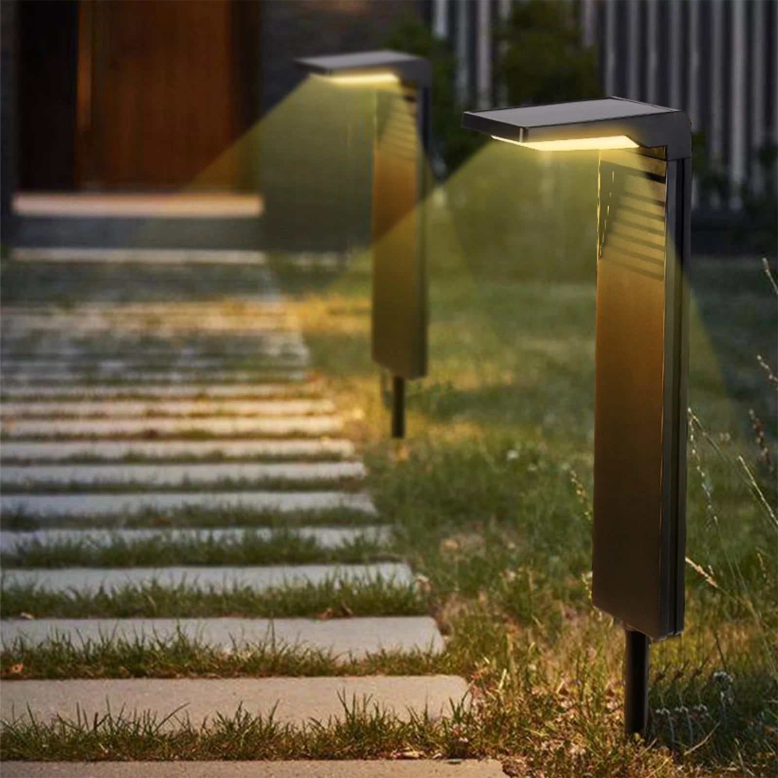 Installation de la lampe solaire dans un massif de fleurs