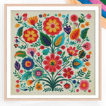 kit broderie point croix motifs floraux colorés toile imprimée aiguilles fils schéma guide technique