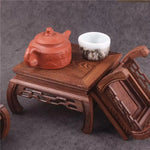 support bois sculpté artisanal marron foncé sculptures opacité
