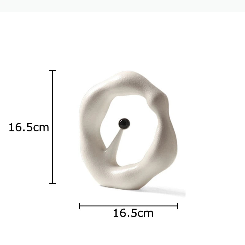 sculpture abstraite contemporaine blanc gris minimaliste texture mat forme organique noire central