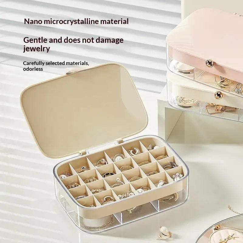 boîte bijoux velours rose clair moderne compartiments transparent couvercle élégant ondulé fixations bijoux voyage